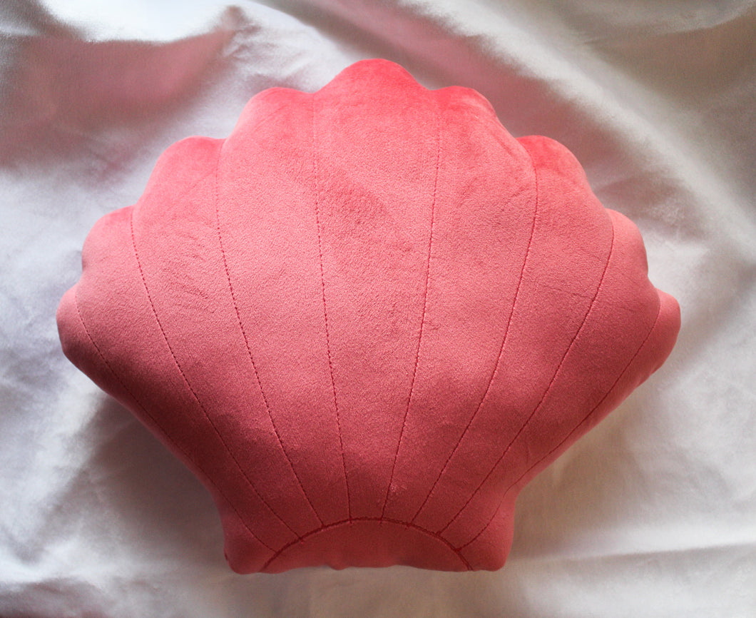 Seashell scallop cushion in bright pink velvet